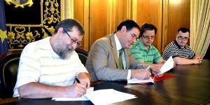 FirmandoConvenioAdocuNota