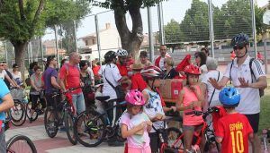 Chocolate, churros y bicicletas en el domingo pre Fiestas en Cabanillas