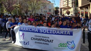 La XXI Marcha Solidaria de Maristas Guadalajara llena la calle Mayor y el centro al grito de Solidaridad