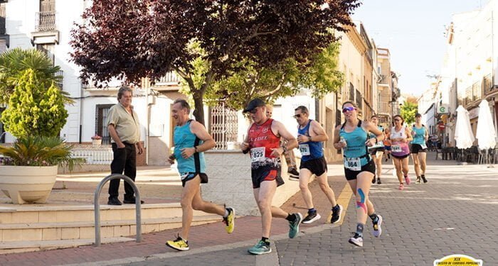 David Cano y María José Engra dominan en el calor de la Villa de Minglanilla